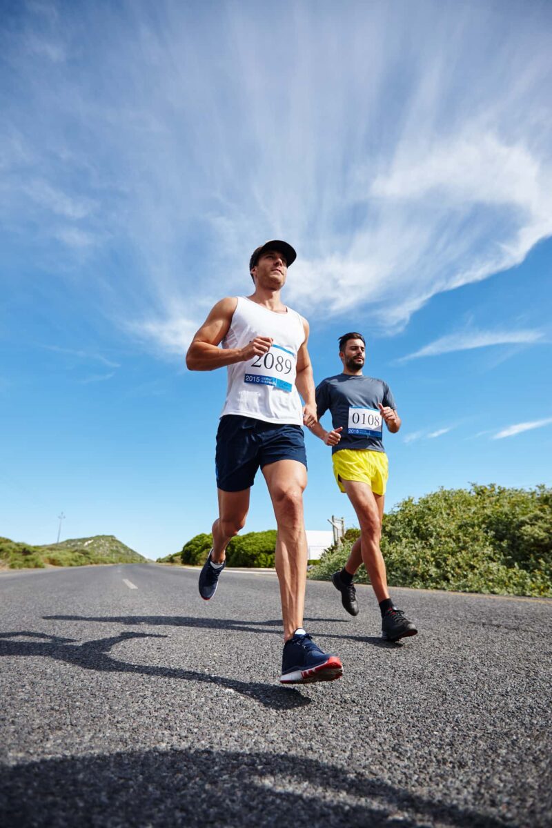 two-men-running-marathon-on-road-2026-01-09-10-07-59-utc