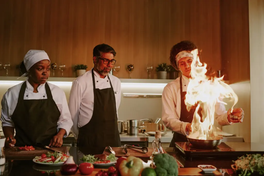 man-demonstrating-frying-skills-2026-01-08-00-09-03-utc