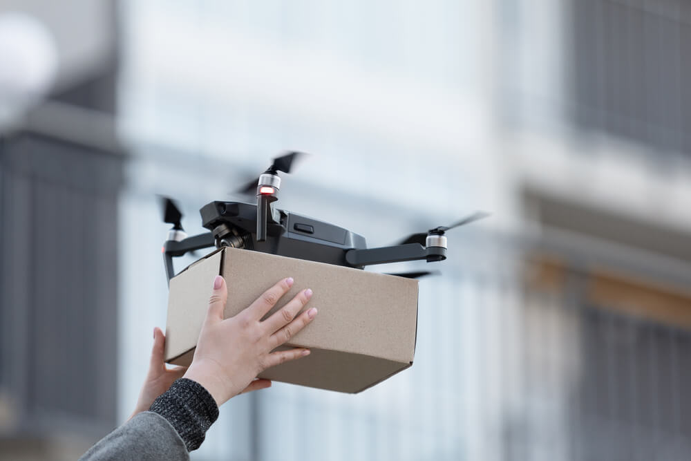 new-drone-with-package-box-delivery-service-moder-2026-01-08-23-23-30-utc