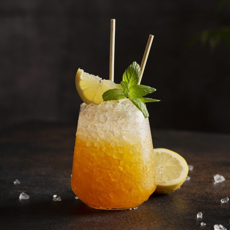 cocktail with crushed ice, lemon and mint