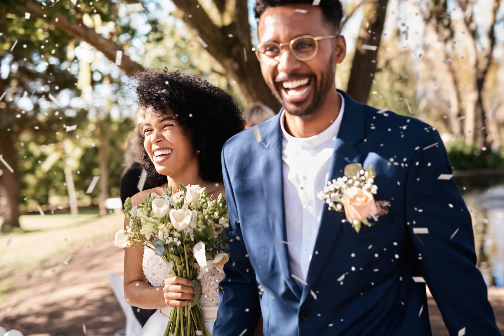 newlyweds-smiling-as-confetti-falls-in-green-setti-2026-03-25-03-56-40-utc