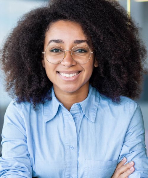 confident-woman-at-desk-in-modern-workplace-2026-01-09-07-39-41-utc