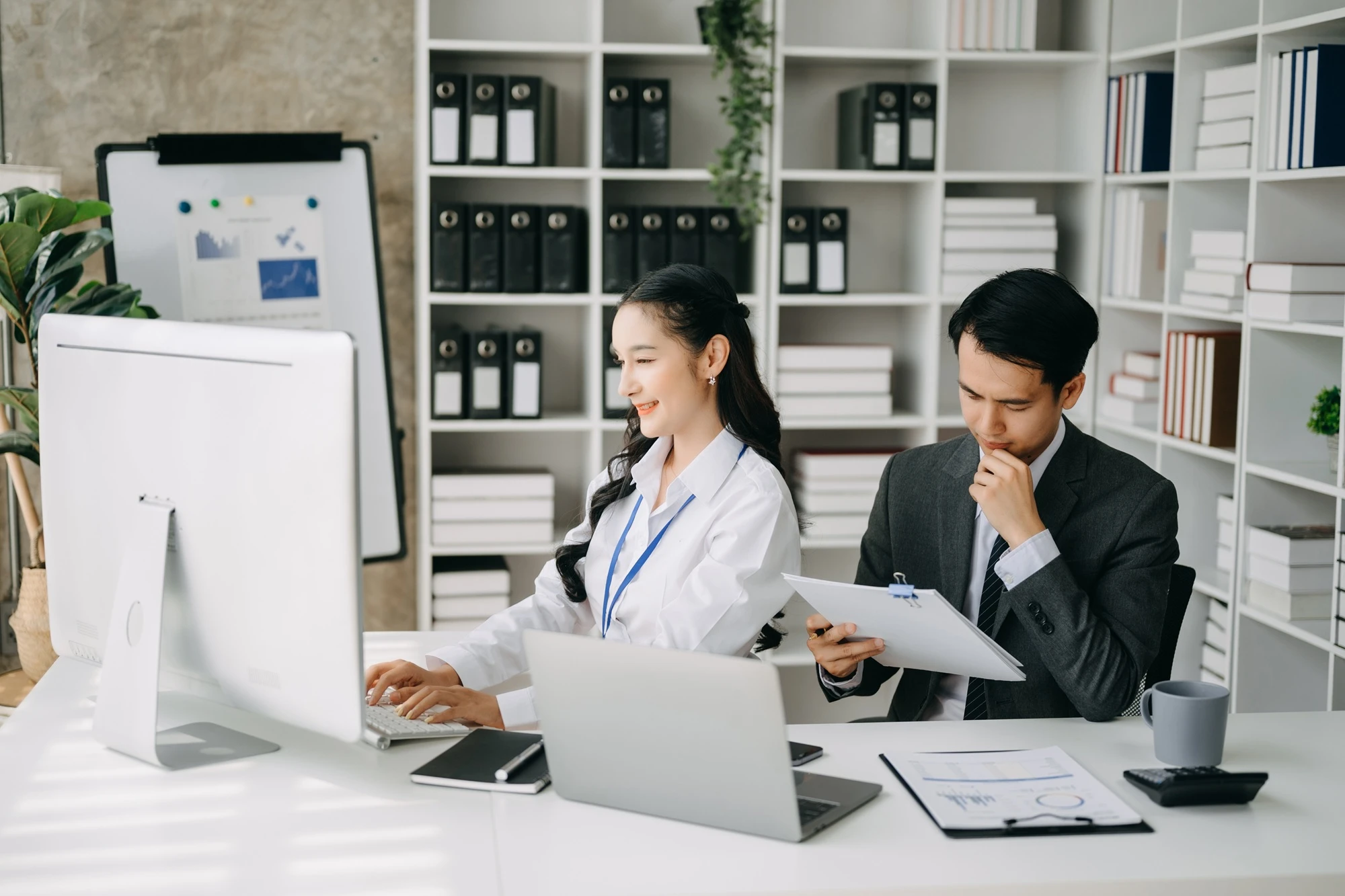 business-professionals-working-at-desk-in-modern-o-2026-09-22-06-44-48-utc