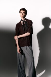 stylish-young-man-showcases-modern-fashion-in-a-mi-2026-01-09-12-07-41-utc